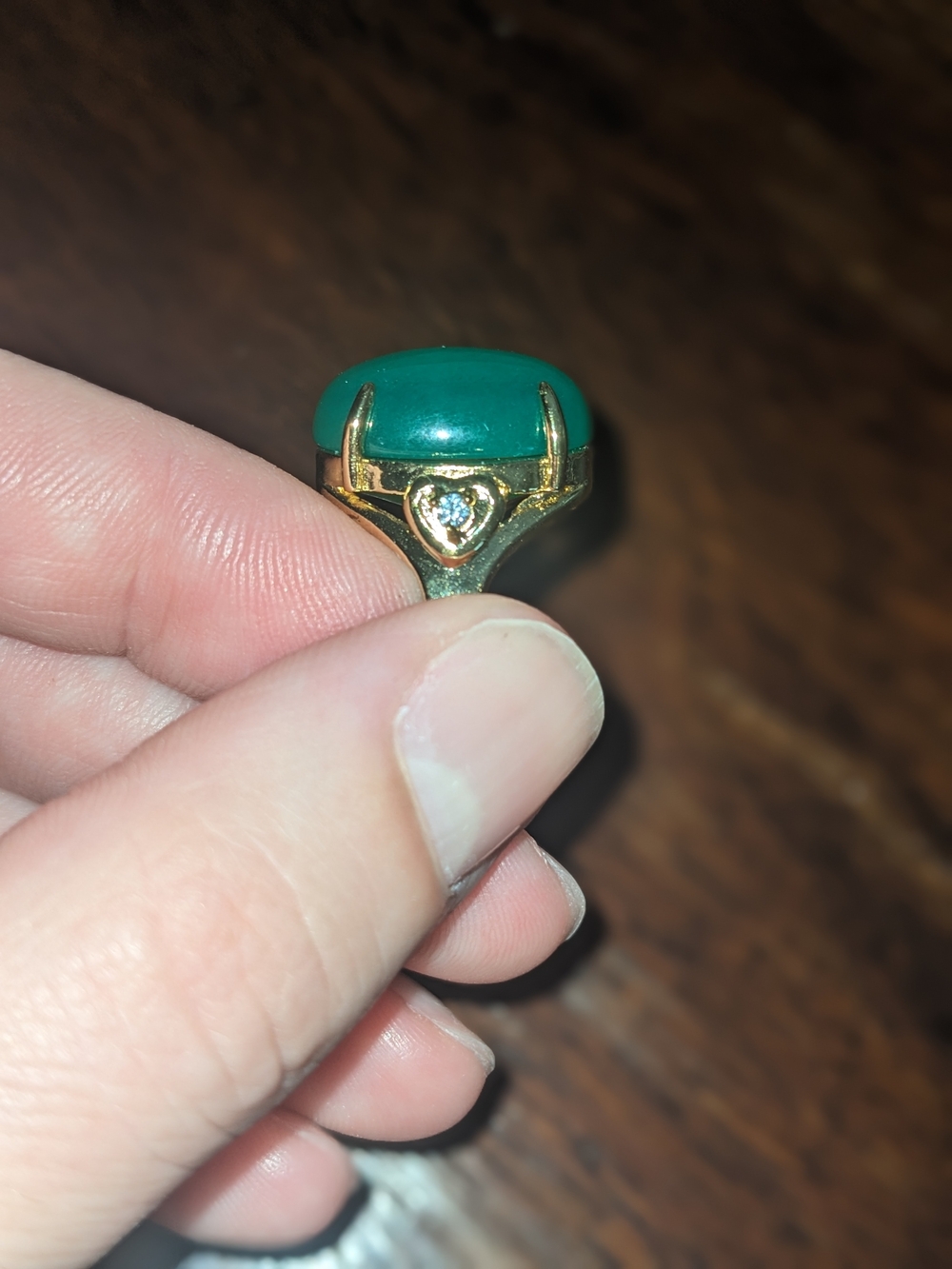 Gold Ring with Green Cabochon and Heart Accent